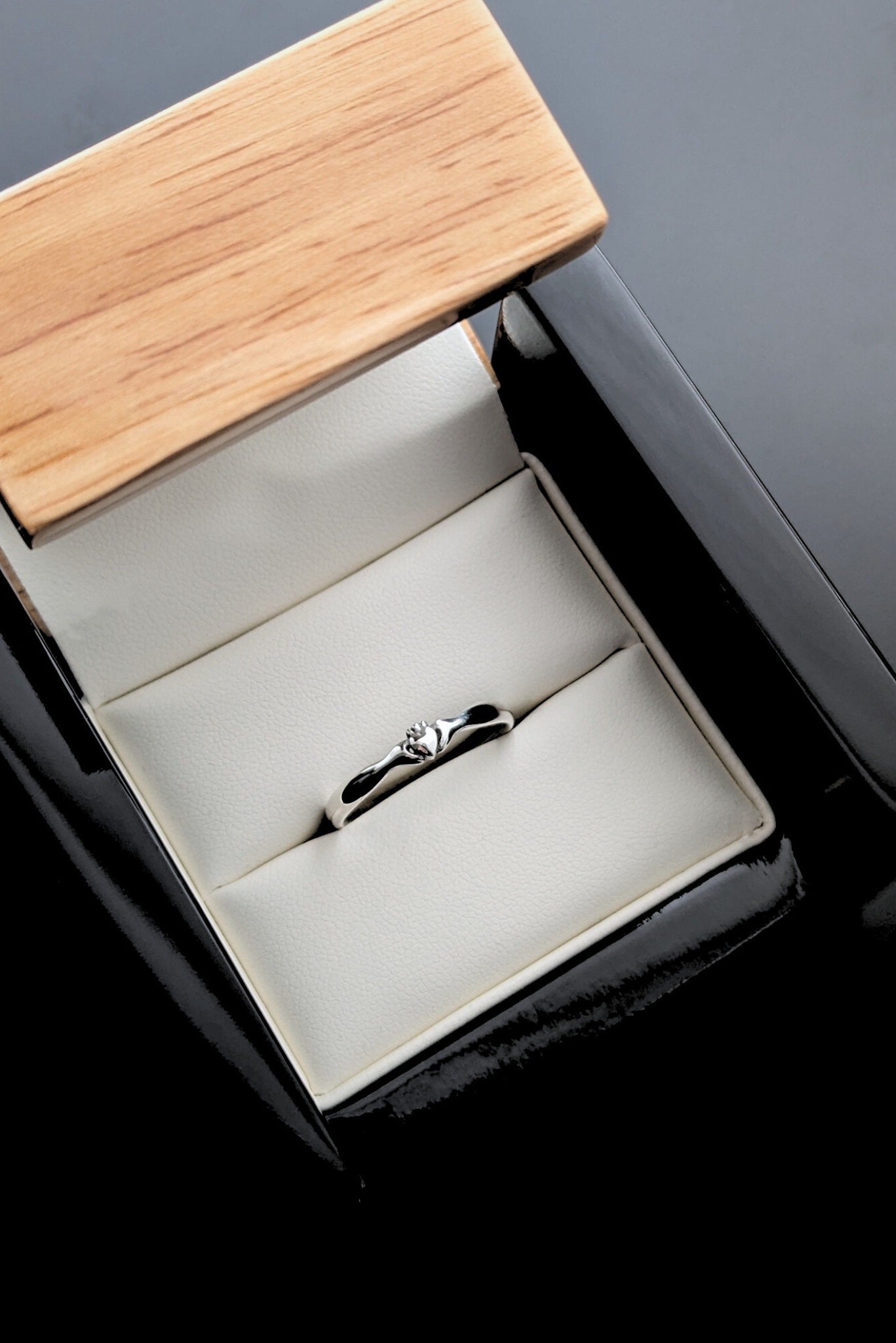 Unique Claddagh ring in silver displayed in a box