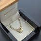 gold claddagh bracelet in box