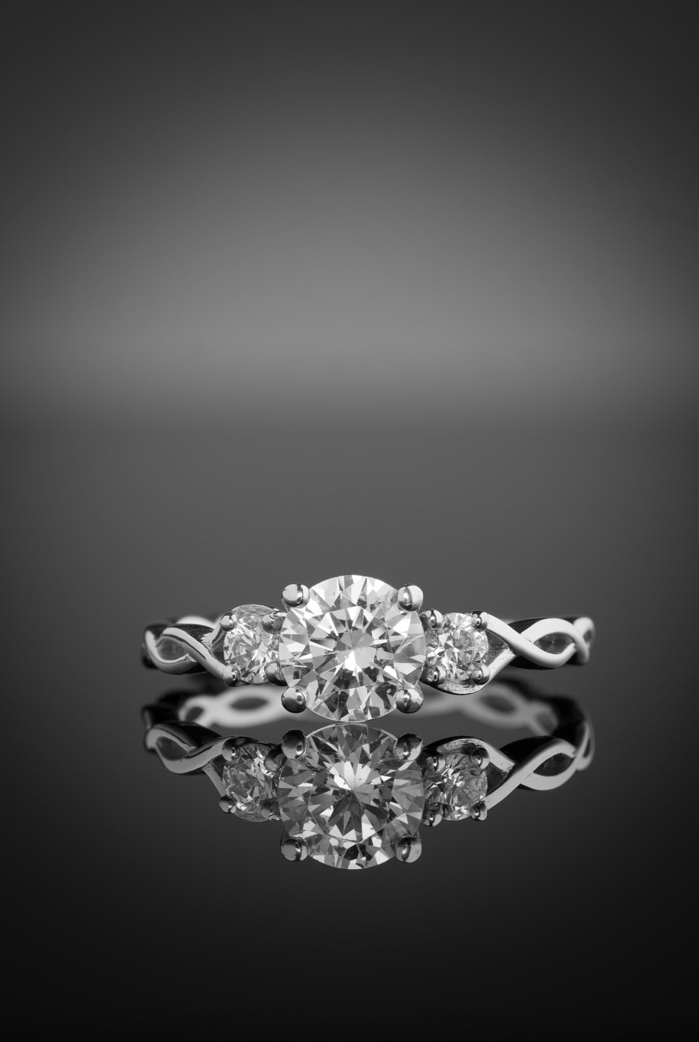 Elegant three stone lab diamond celtic ring in white gold